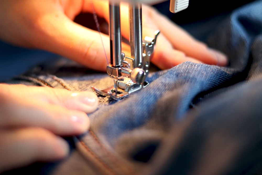Person sewing clothes